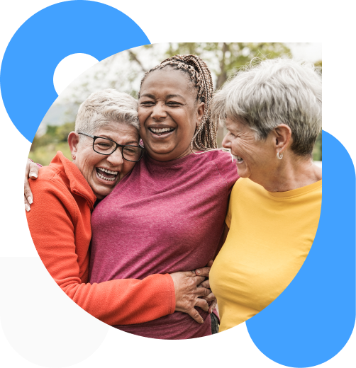 3 smiling women hugging