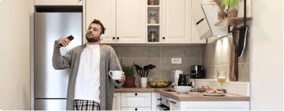 a man dancing in the kitchen